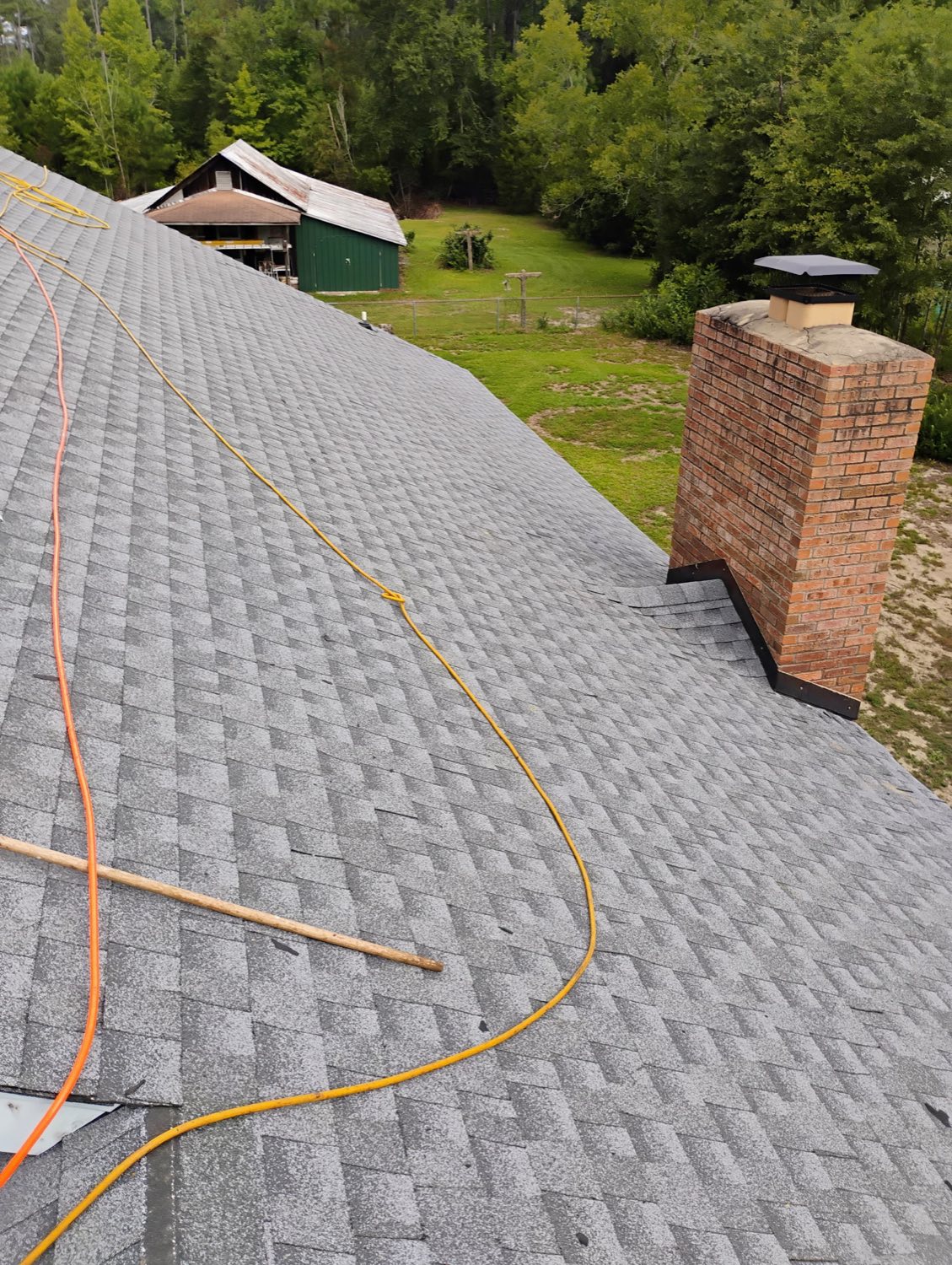 New roof and chimney flashing after repair