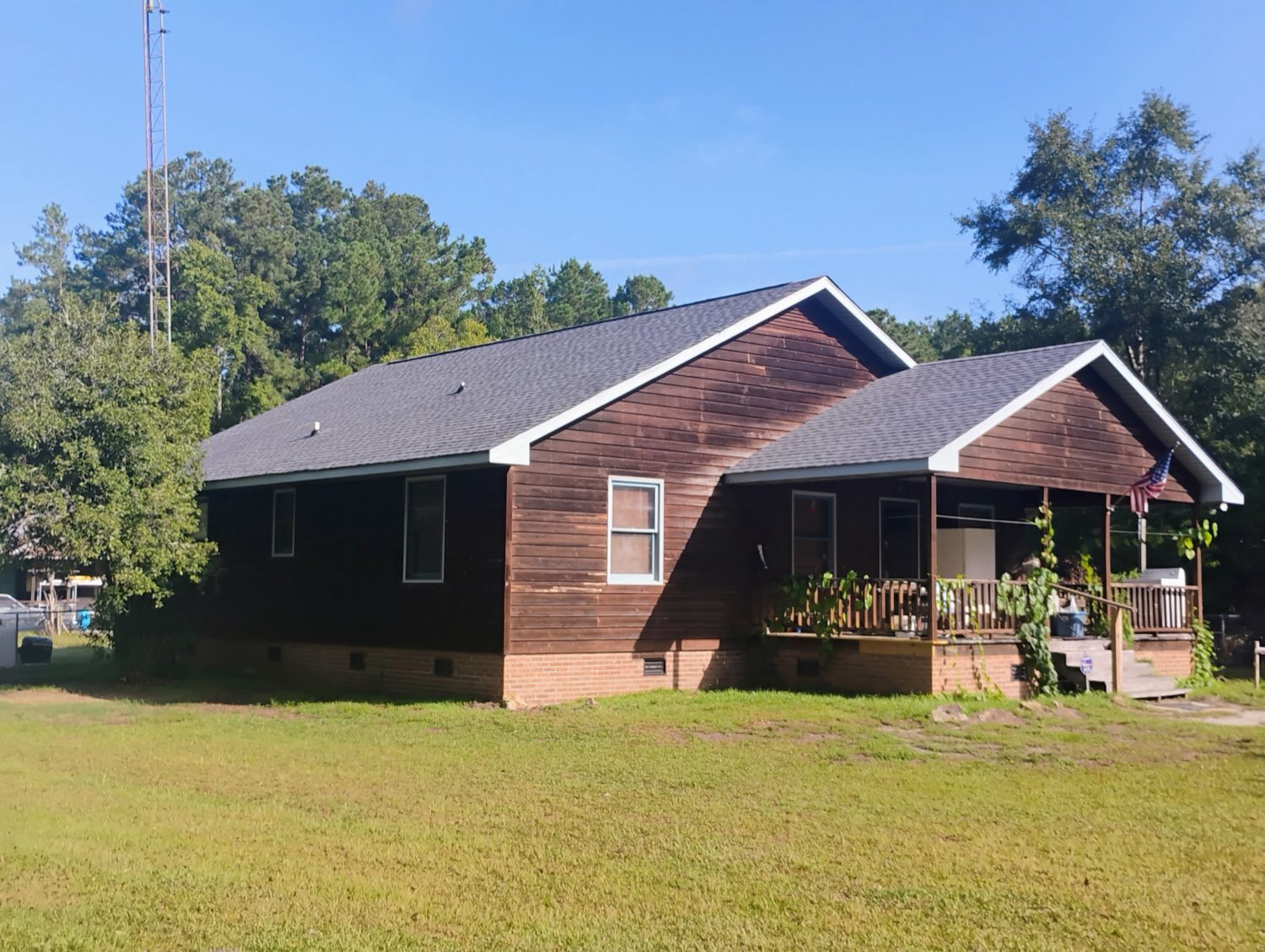 Completed home with new roof by JayBrook LLC