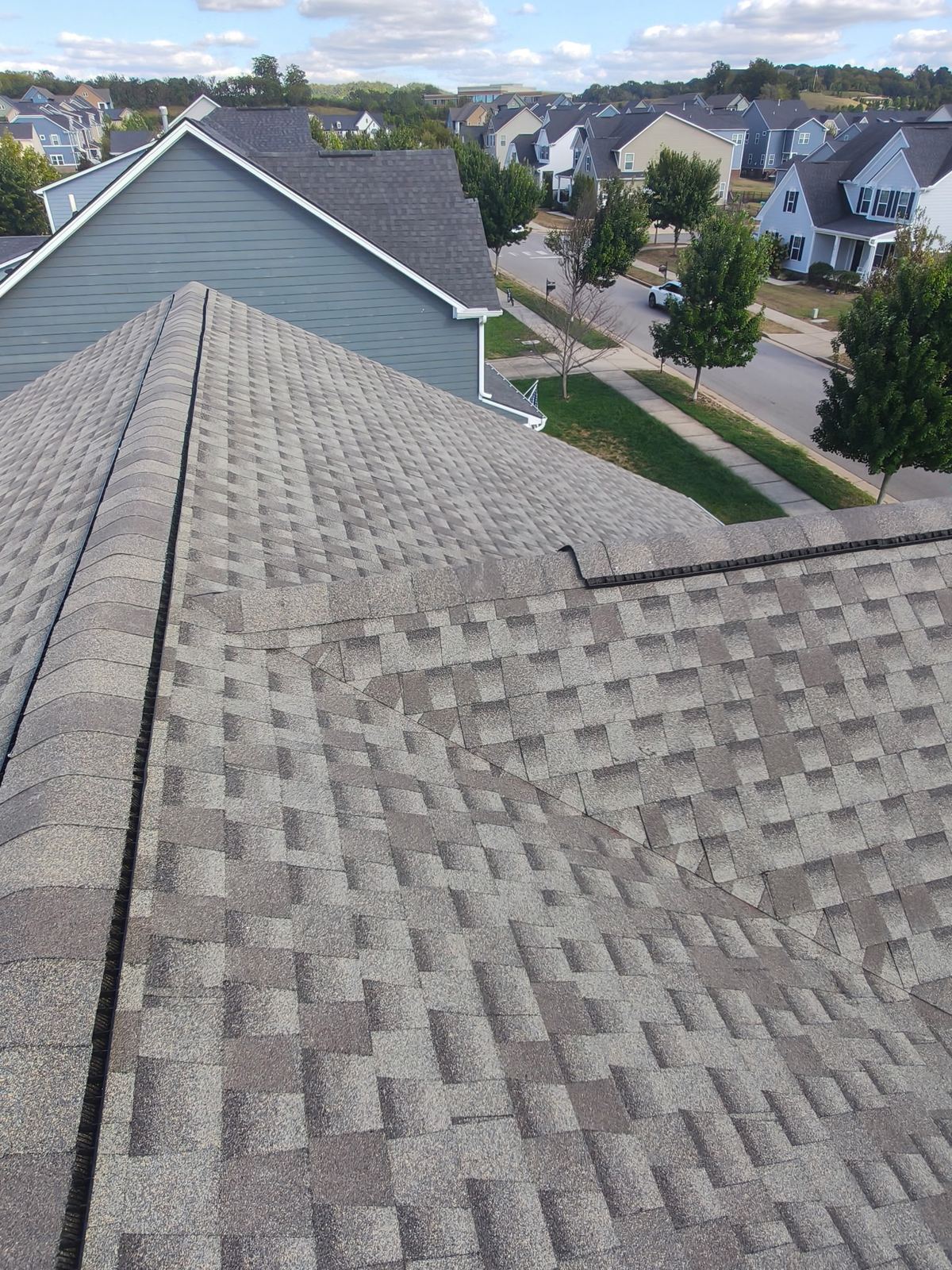 New shingles at the hip and valley with ridge vent